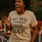 Hot Mess Express—Now Boarding for July | Funny Summer Mom Shirt by Copper Boom